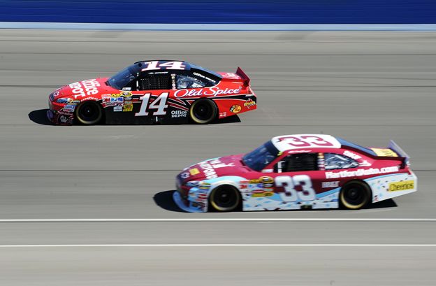 Tony Stewart (No. 14) races Clint Bowyer (No. 33) during the NASCAR Sprint Cup Series Pepsi Max 400 on Sunday at Auto Club Speedway in Fontana, Calif. Stewart and Bowyer finished first and second in the fourth race in the Chase for the NASCAR Sprint Cup. Credit: Harry How/Getty Images